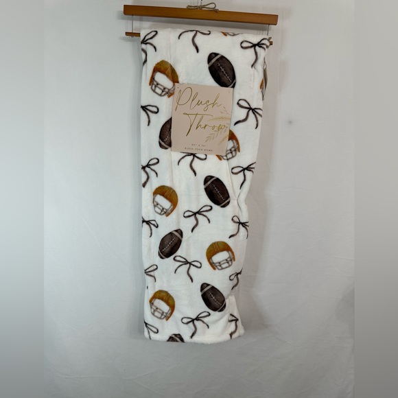 Artisan 34 Football Bow Plush Throw - Picture 1 of 7